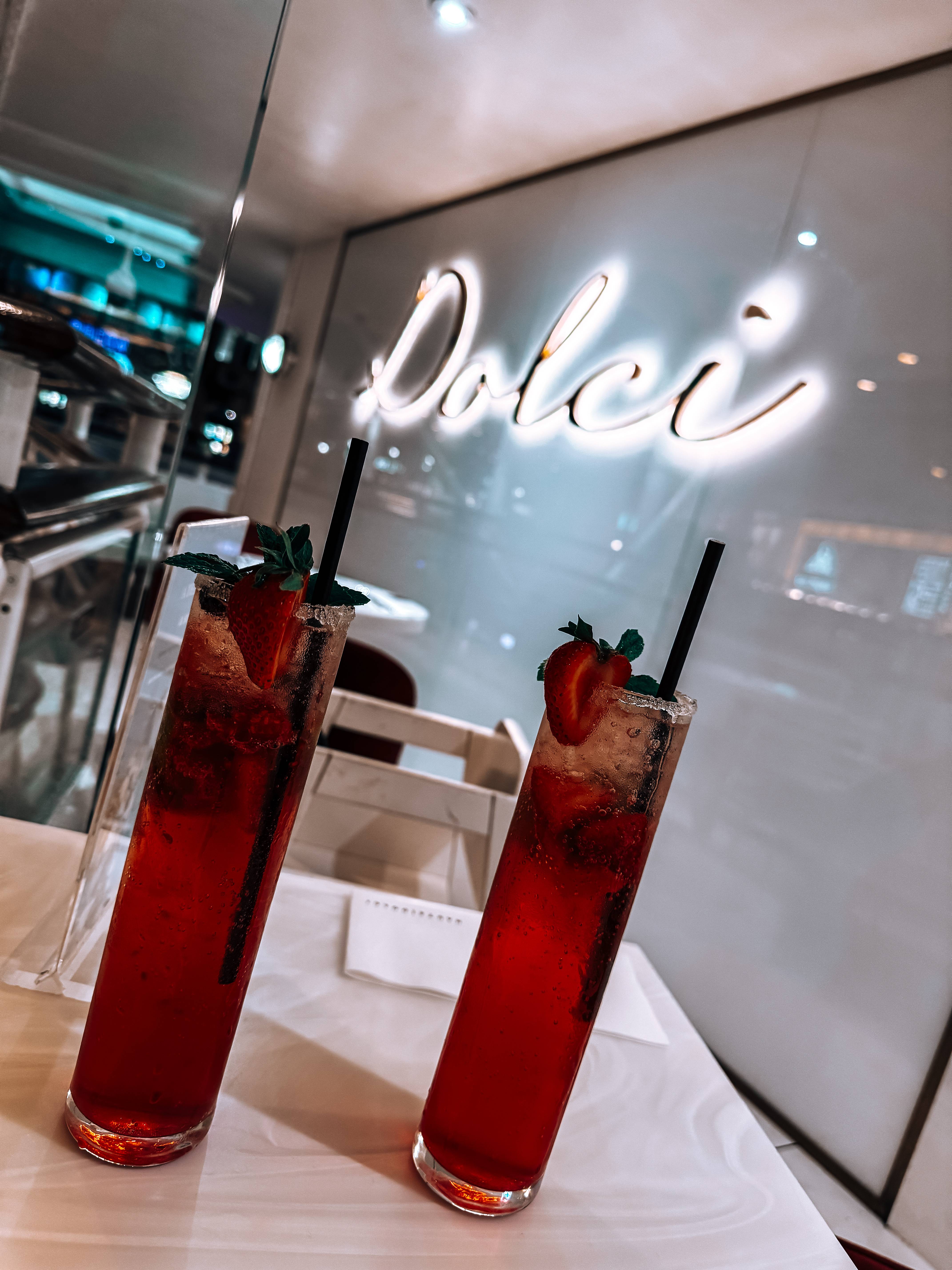 2 drinks shown on a table with dolci logo in the background